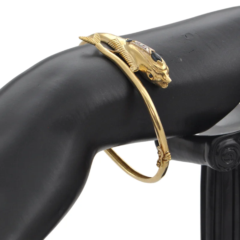 luxury gold bangles for women-Vintage Gold Diamond and Sapphire Dolphin Hinged Bangle