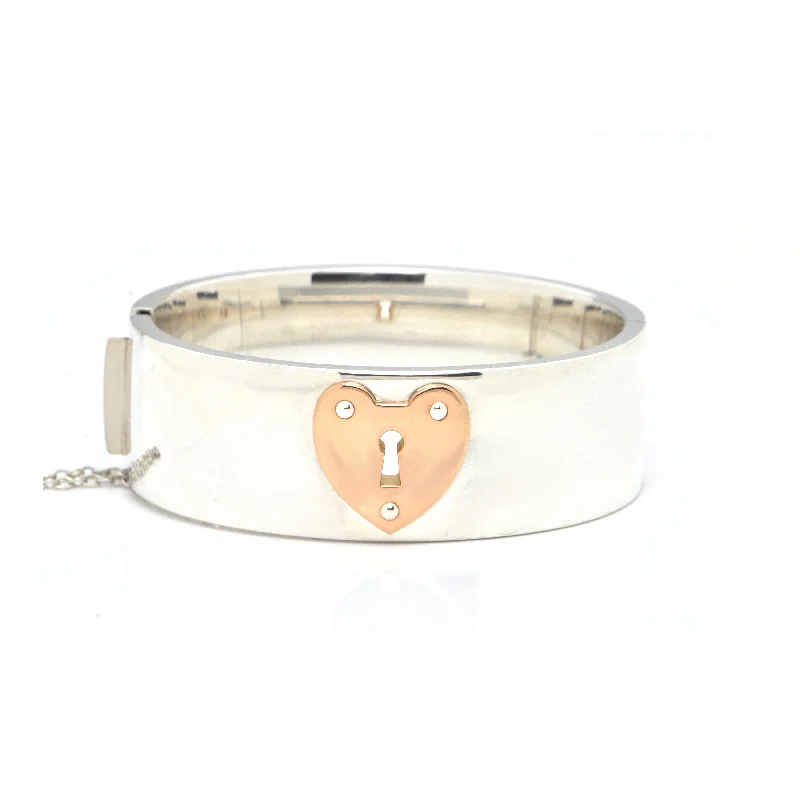 colorful bangles for women-Vintage Tiffany & Co. Large Hinged 925 Sterling Silver Bangle with 18K Rose Gold Heart