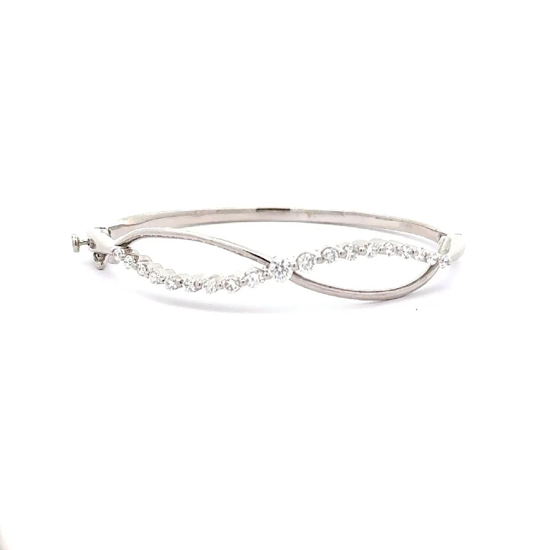 vintage charm bracelets for women-Diamond 18k White Gold Infinity Row Ribbon Bangle Bracelet