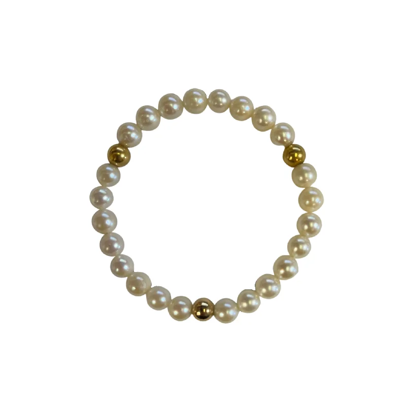 classic gold bangles for women-Daisy Exclusive Pearl and 18K Yellow Gold Ball Bracelet