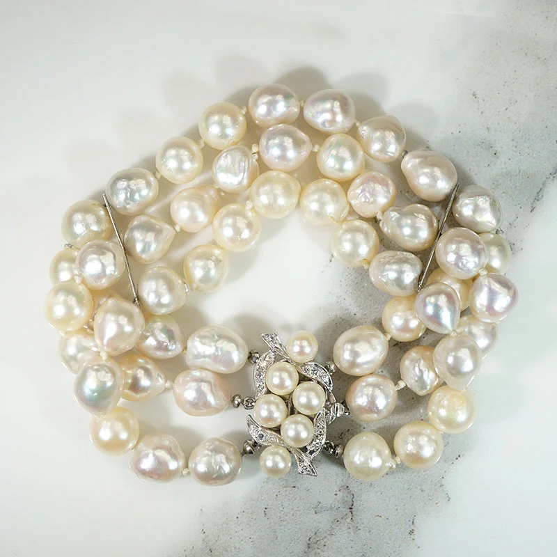 statement bangles for women-Glamorous Three-Strand Pearl Bracelet with Pearl & Diamond Clasp