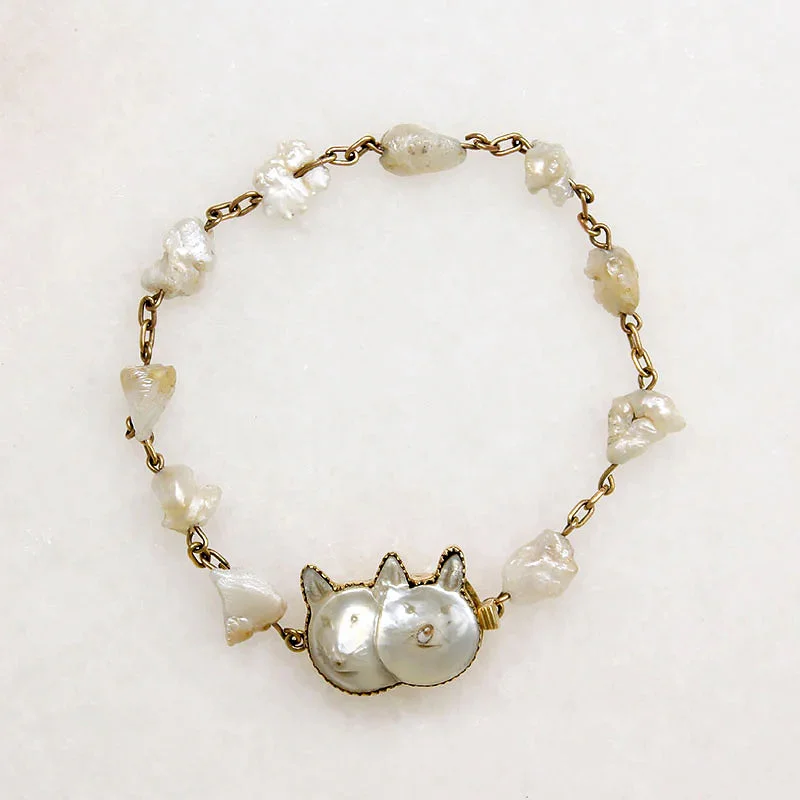 gemstone bangles for women-Whimsical Pearl & Gold Kitty Cat Bracelet by A.O. Kopp