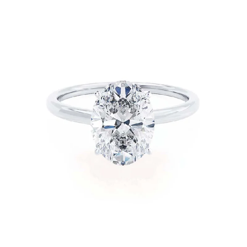 cushion-cut diamond engagement rings for women-LULU - Oval Diamond Petite Solitaire Platinum 950 Engagement Ring